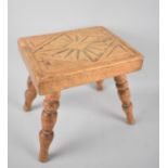 A Small Carved Wooden rectangular Topped Stool with Turned Supports, 22cms Wide