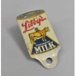 A Vintage Milk Bottle Opener/Puncturer, "Libby's Evaporated Milk", in the Form of a Tin