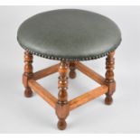 A Mid 20th Century Circular Topped Stool, 34cms Diameter and 31cms High