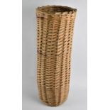 A Cylindrical Wicker Stick Basket, 56cms High