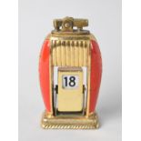 A Mid 20th Century Enamelled Brass Novelty Desk Top Calendar and Lighter with Automatic Date