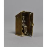 A Late 19th/Early 20th Century Novelty Cheroot Cutter Fob in the form of Nude Lady in Outhouse,