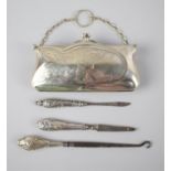 A Silver Plated Purse with Silk Lining and Three Silver Handled Manicure Tools