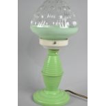 A Vintage Green Celluloid Table Lamp with Glass Shade, 34cms High