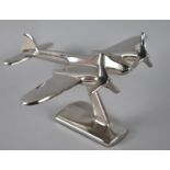 A Modern Chrome Desk Top Model of a WWII Mosquito, 18cms Long