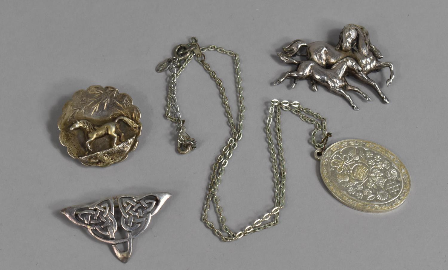 A Collection of Silver and White Metal Jewellery to Include Horse Brooches, Pendant Necklace and a