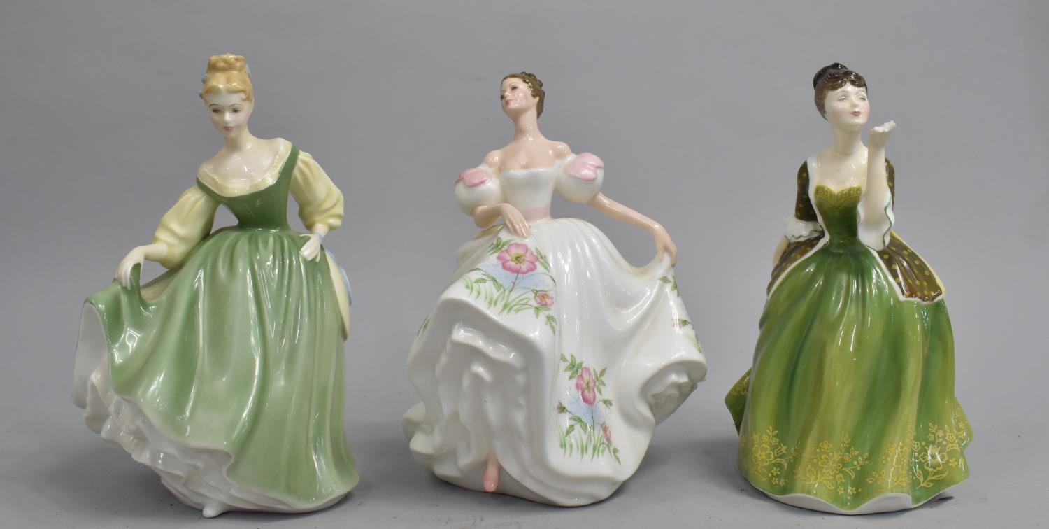 A Set of Three Royal Doulton Figures, Fleur (Hand AF), Lucy and Fair Lady