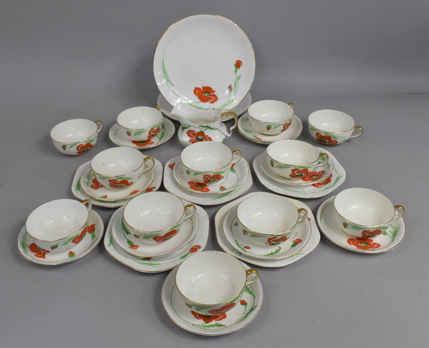 A Carlton China Tea set Decorated with Poppy Design to comprise Twelve Cups, Twelve Saucers, Milk