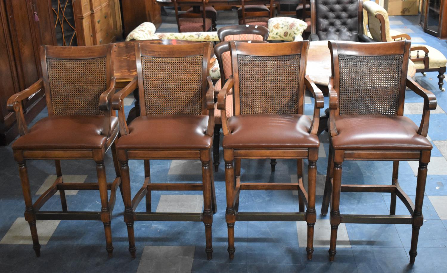 A Set of Four Nice Quality Leather Upholstered Scrolled Arm Cane Backed Kitchen Bar Stools