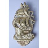A Modern Brass Door Knocker in the Form of a 16th Century Galleon, 17cms High