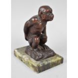 A Bronze Effect Resin Study of a Seated Monkey Set on Green Marble Plinth, 14cms High