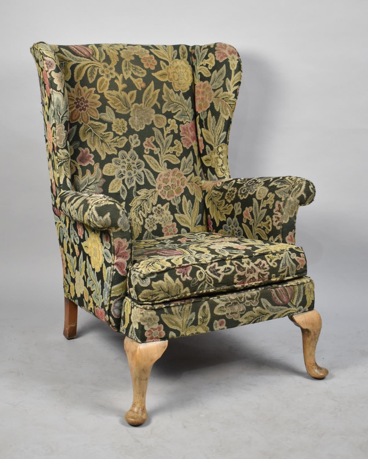 A Vintage Wing Armchair with Tapestry Upholstery