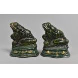 A Pair of Modern Cast Metal Doorstops in the Form of Seated Frogs, 9cms High