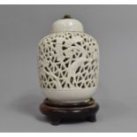 A Chinese Blanc De Chine Ginger Jar, Pierced Prunus Design, Now Converted to Table Lamp on Wooden