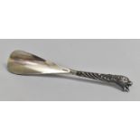 A Silver Plated Shoe Horn with Lioness Head Handle