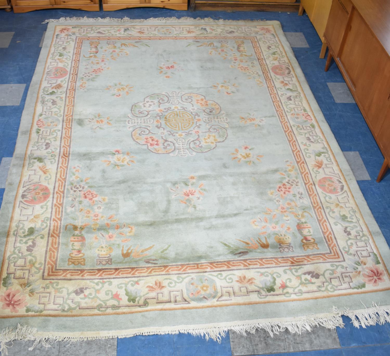 A Large Chinese Woollen Carpet, 329x248cm