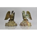 A Pair of Empire Style Verdigris Bronze Eagles Perched with Wings Aback on Naturalistic Rock Bases
