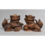 A Pair of Carved Chinese Hardwood Temple Lions, 15cm high