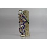 A Chinese Porcelain Figural Spill Vase Modelled as Chinese Lady Labourer Carrying Basket decorated