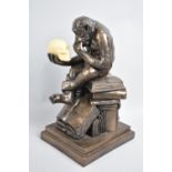A Modern Bronze Effect Resin Figural Study of Monkey with Human Skull, Evolution, by Darwin, 20cms