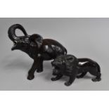 Two Ebonized Resin Figures of African Elephant and Lion