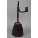 An Early English Iron Rush Light on Turned Wooden Tapering Support, 28cms High