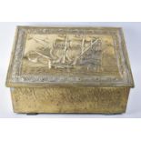 A Mid 20th century Brass Slipper Box with Sloping Hinged Lid decorated with Galleon, 44cms Wide