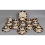 An Edwardian Imari Trim pattern Tea Set to comprise Cups, Saucers, Side Plates, Cake Plate, Milk Jug