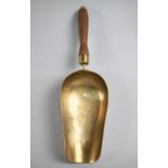 A Wooden Handled Brass Grain Scoop, 43cms Long