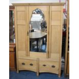 A Stripped Pine Mirror Fronted Wardrobe with Base Drawer, 134cm wide