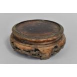 A 19th Century Chinese Hardwood Vase Stand of Circular Form with Pierced Sides, to fit 11cm Base,