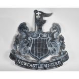 A Fret Cut Metal Wall Mounting for Newcastle United Football Club, 49cm high