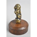 A Vintage Brass Car Mascot in the Form of a Seated Lion Mounted on Turned Wooden Stand, Overall