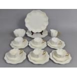 A Coalport White and Gilt Decorated Tea Set of Reeded Form to comprise Six Cups, Saucers and Side