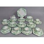 An Early 20th Century Grafton China Green and Black Floral Decorated Tea Set of Shaped Form