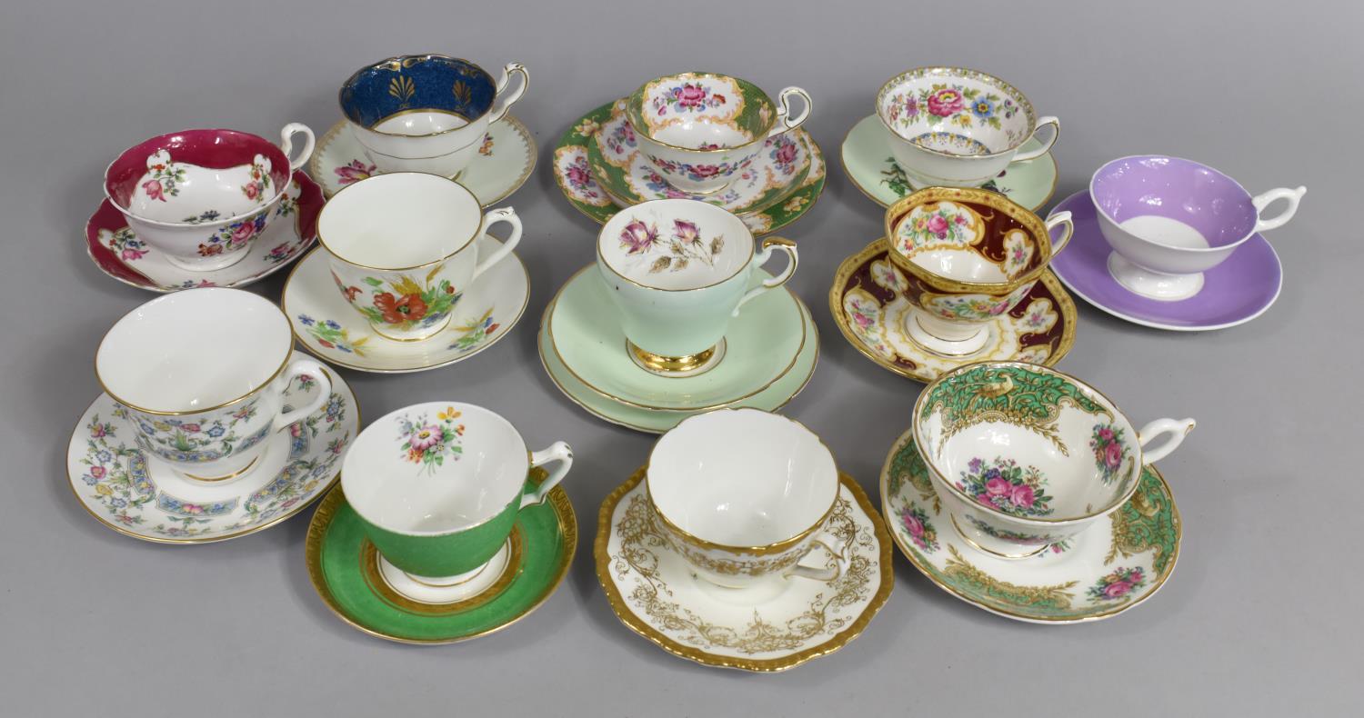 A Collection of Various Cabinet Cups and Saucers to comprise Examples by Royal Albert Lady Hamilton,