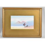 A Framed Gouache by Frank Holme, Desert Scene with Arabs, Camels and Pyramids, 24x14cm
