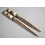 A Pair of Mid 20th Century Ceramic Handled Brass Letter Openers with Floral Decoration, 24cms Long
