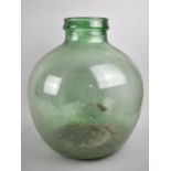 A Vintage Green Glass Carboy, 37cm high