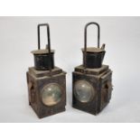 A Pair of Vintage Black Painted Railway Lamps with Double Bullseye Glass Lenses, Each 47cms High