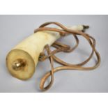 A Reproduction Brass and Horn Powder Flask, 29cms Long