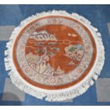 A Circular Chinese Woollen Patterned Rug, 122cm diameter