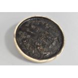 A Reproduction Bronze Effect Circular Disc Decorated in Relief with Classical Figures and Faux