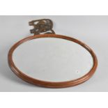 An Art Nouveau Wall Mounting Shaving Mirror on Hinged Brass Bracket, 31cm high