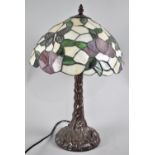 A Reproduction Tiffany Style Table Lamp with Butterfly Shade, 46cms High