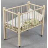 A Vintage Wooden Dolls Cot, 62cm wide