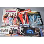 A Collection of 33 and 45rpm records to Include Status Quo, Tina Turner, Madonna, Samantha Mumba,