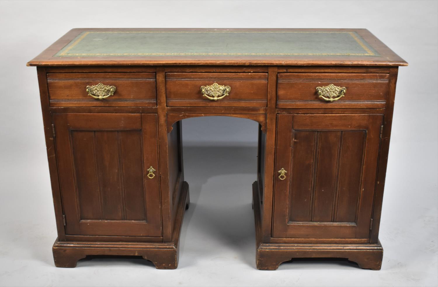 A Vintage Kneehold Writing Desk with Three Drawers and Tooled Leather Writing Surface, 112cms Wide