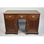 A Vintage Kneehold Writing Desk with Three Drawers and Tooled Leather Writing Surface, 112cms Wide