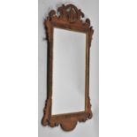 A Fret Cut Mahogany Georgian Style Wall Mirror, 81x47cms